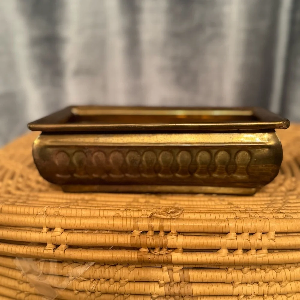 vintage brass planter, also known as a jardinière or cachepot.